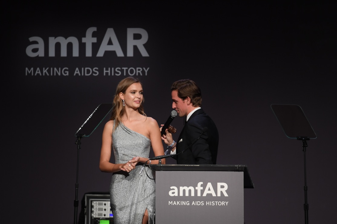 Josephine Skriver wears Harry Winston earrings during auction at amfAR New York 2017. Photo via Getty Images.
